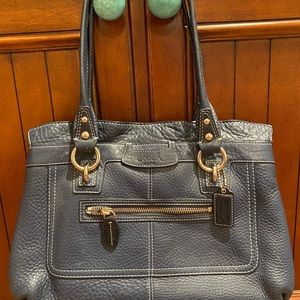 Blue leather Coach purse.